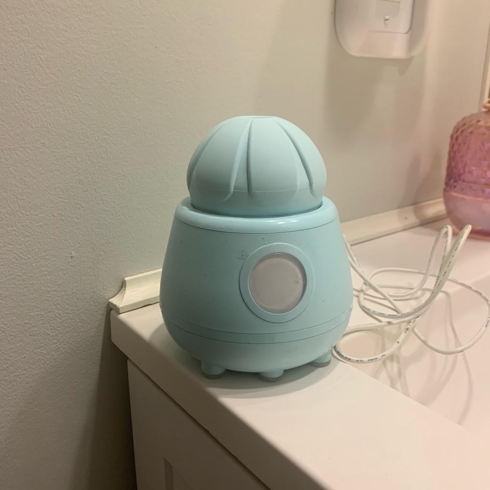 Tao ona facial cleansing brush with UV cleaner.